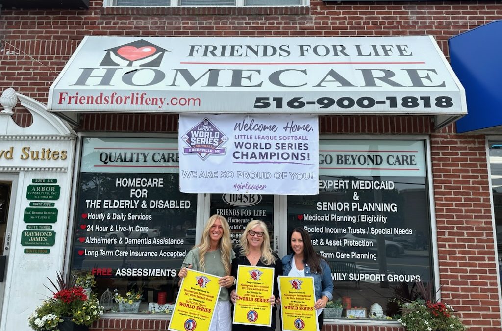 Chamber Members Displaying Complimentary Posters in Honor of Girls Softball Team World Champions!
